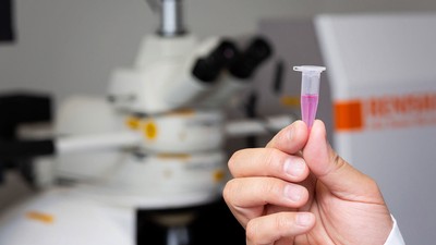 Zhou holding the nanoprobe.