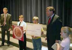 Zions bank check presentation to Edith Bowen school