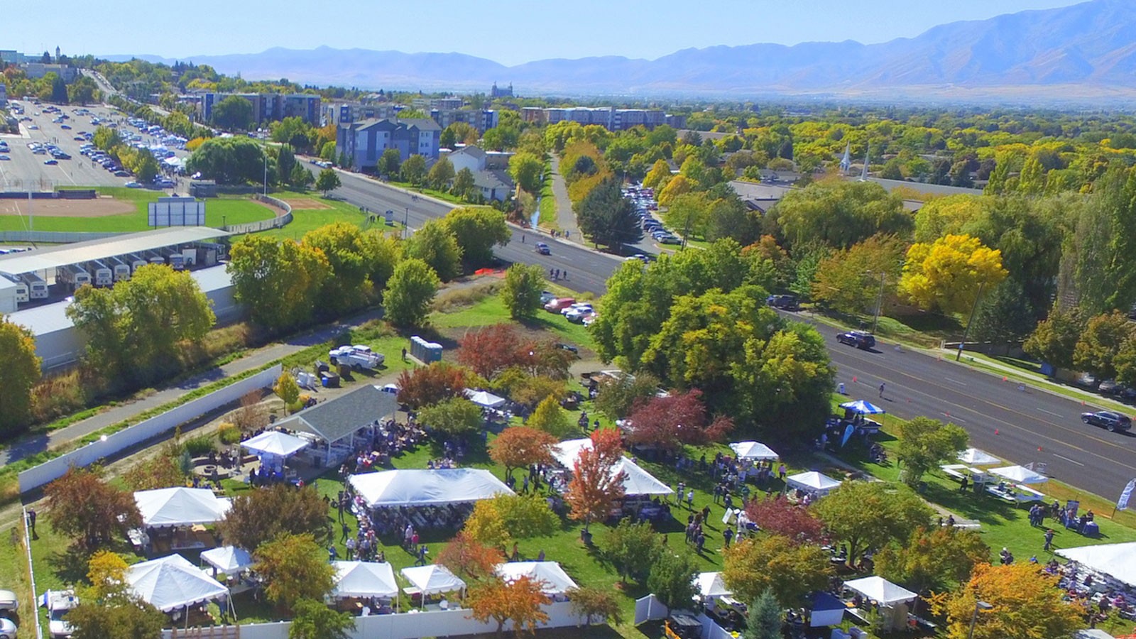 An aerial view shows a previous year's Utah Ag Products Barbecue at Craig Aston Park.