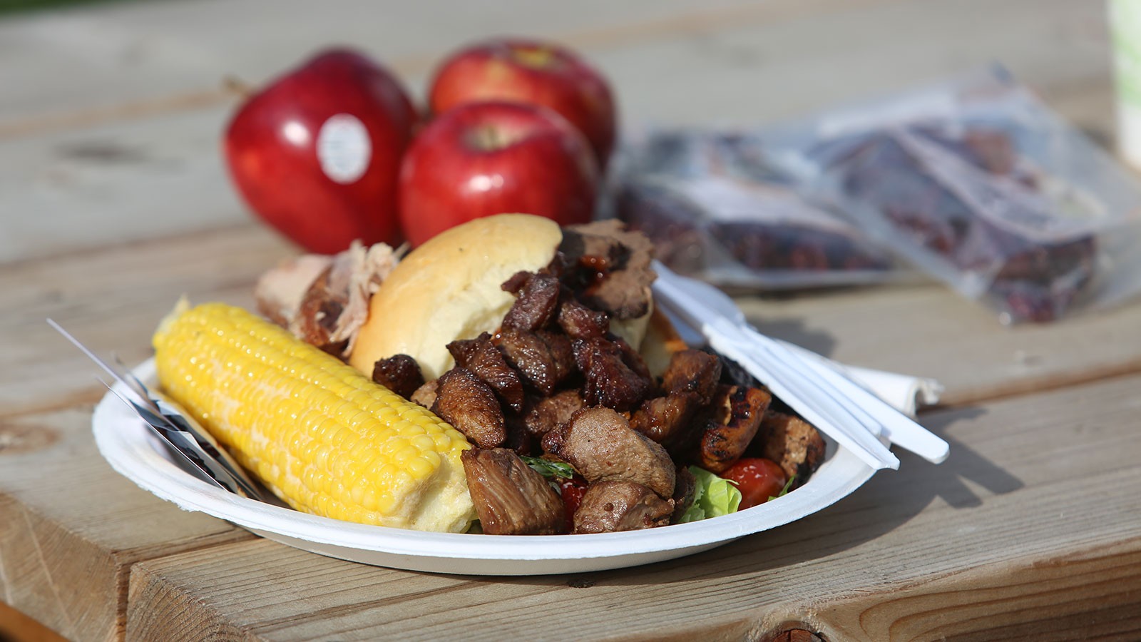 A plate loaded with barbecue at a previous Agricultural Products Barbecue.