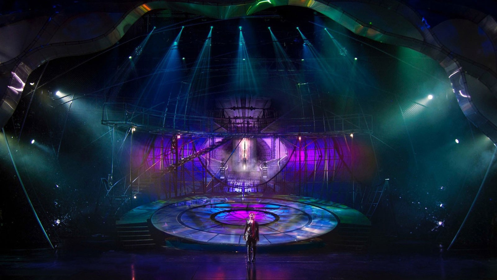 An elaborate set is seen on a stage.