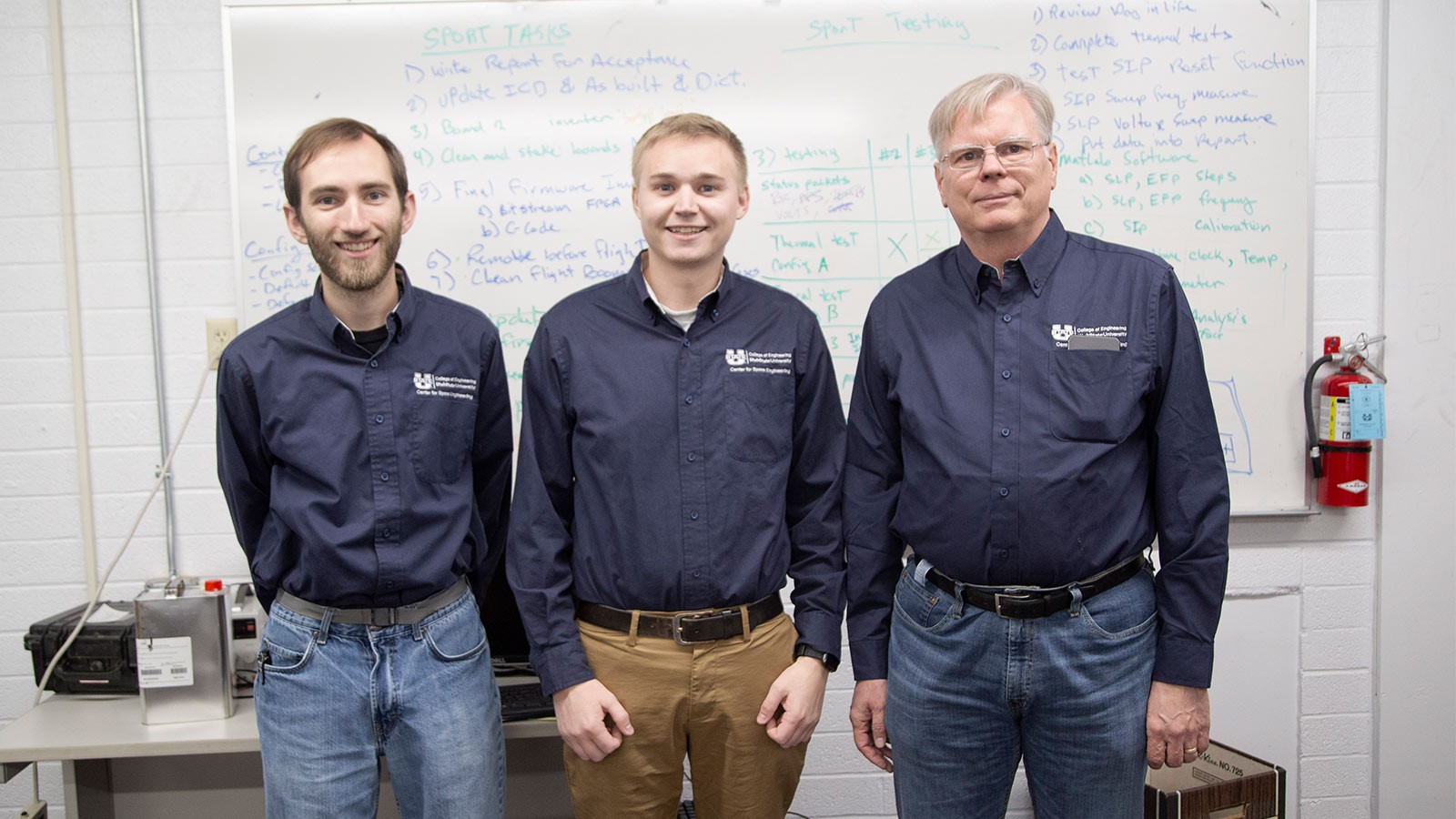Three USU engineers.