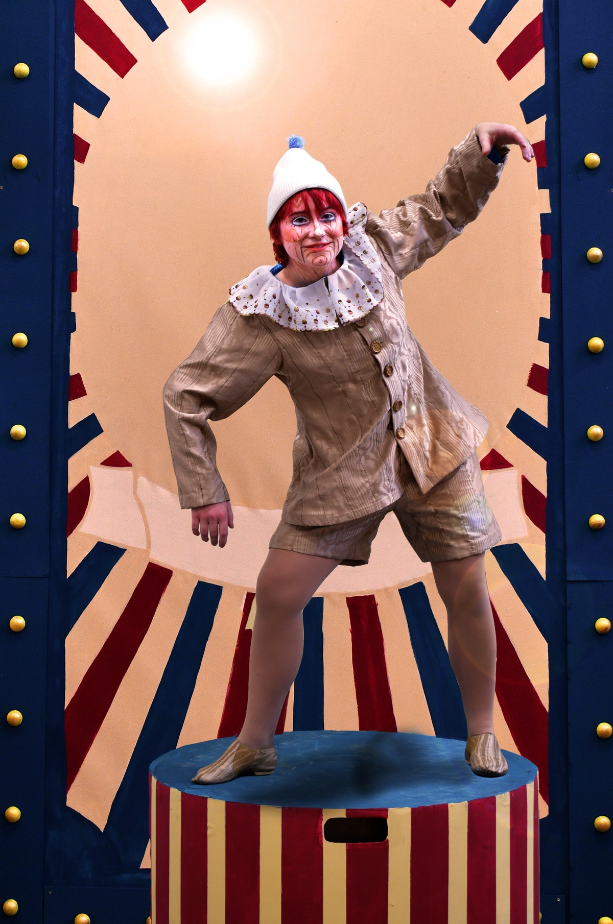 An actor dressed as Pinocchio.