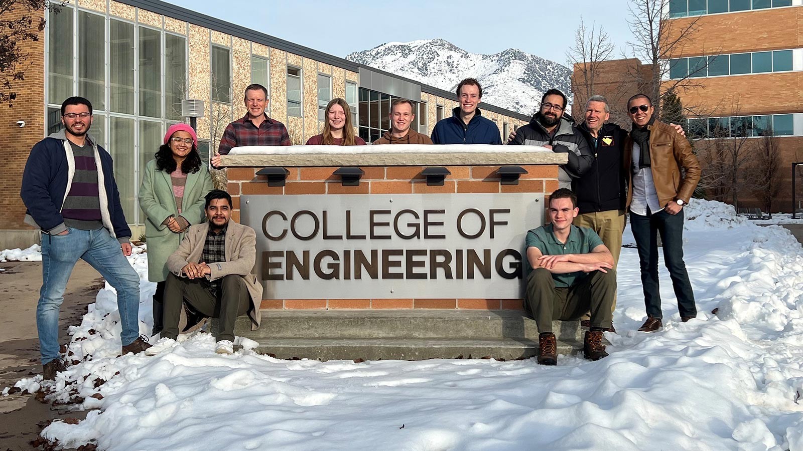 Students and professors stand by the