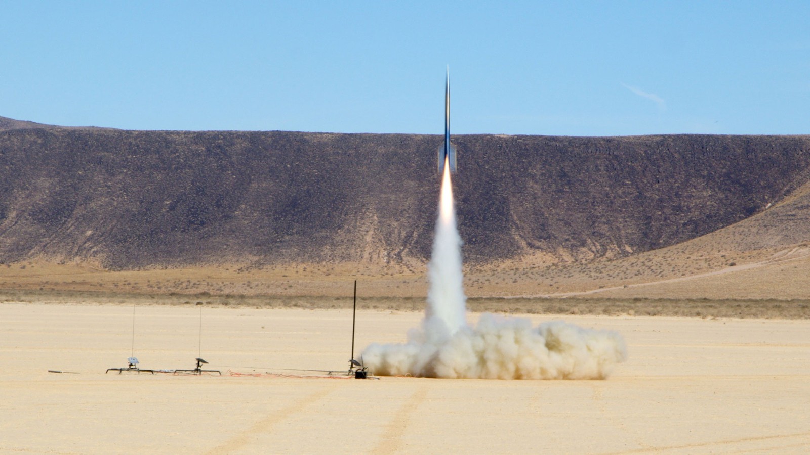 A small rocket is shot into the air.