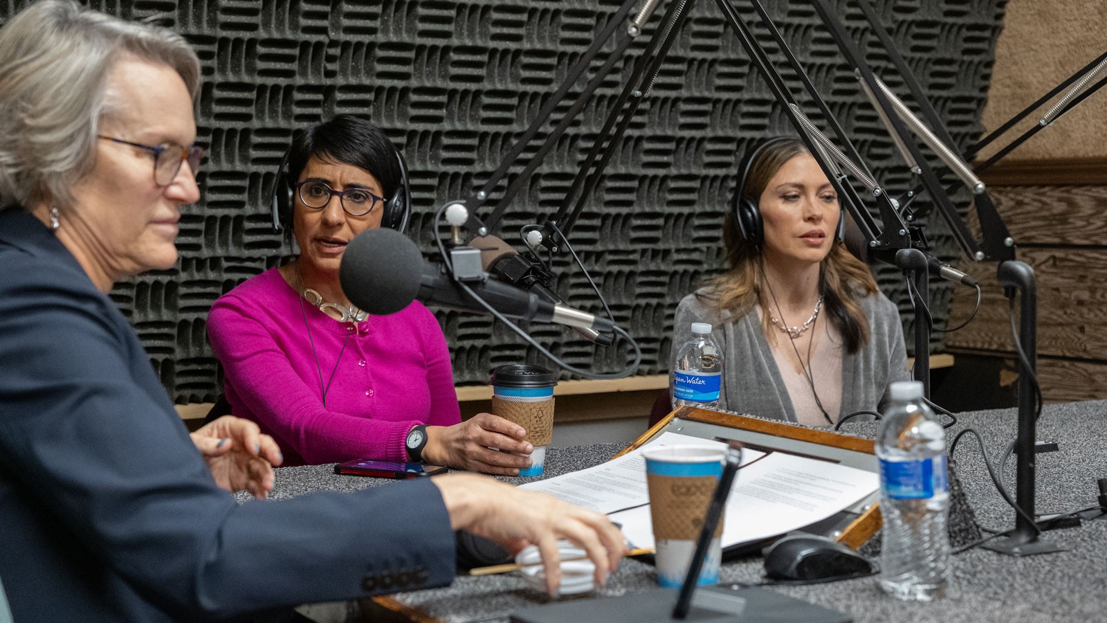Elizabeth Cantwell, Irshad Manji and Allison Gerrard in a radio studio.