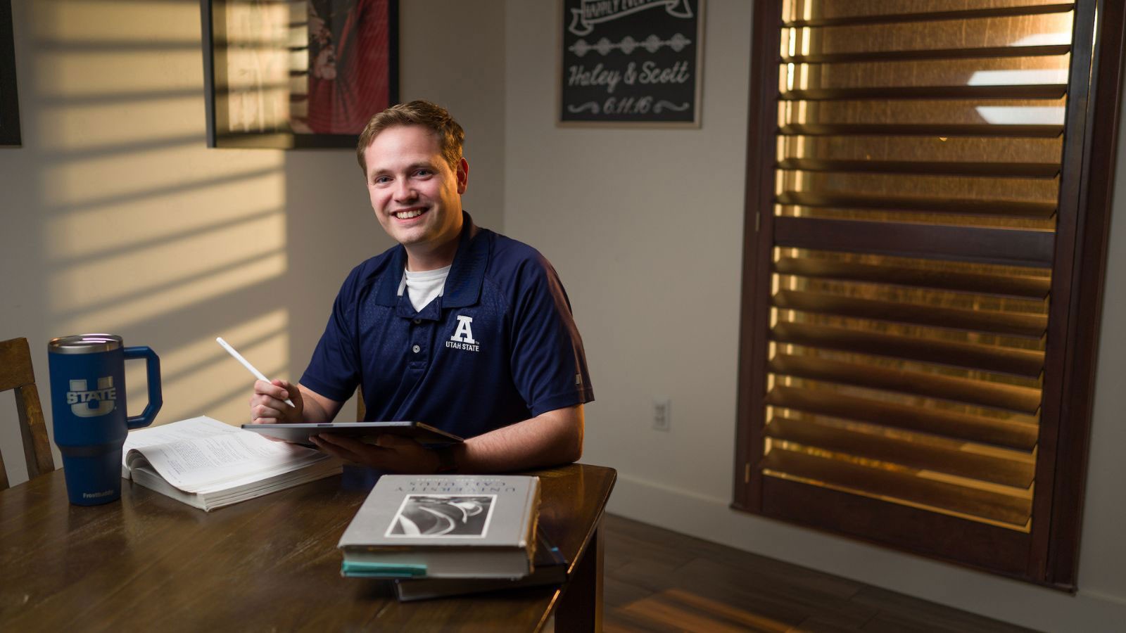 A student studying at a desk.