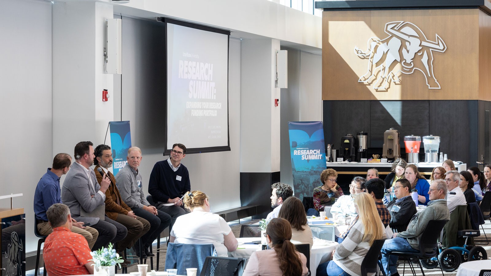 A panel presentation at a conference.
