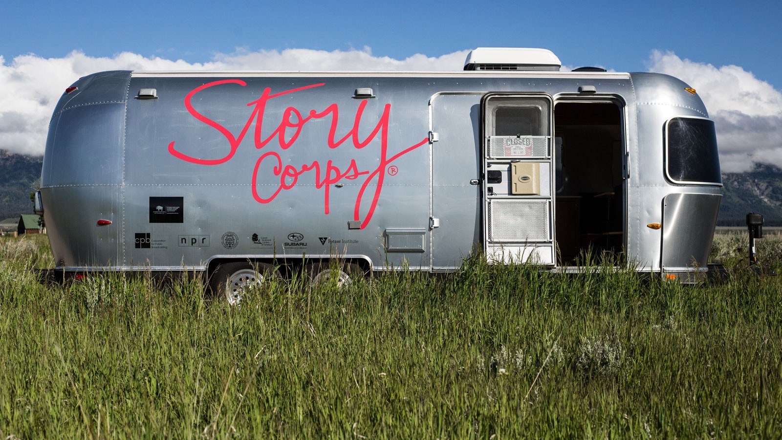 An Airstream trailer with "Story Corps" written on the side.