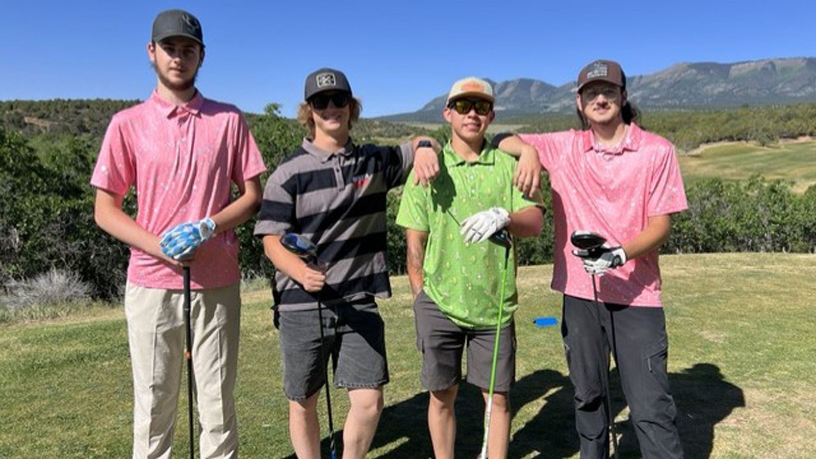 Golfers posing for a photo.
