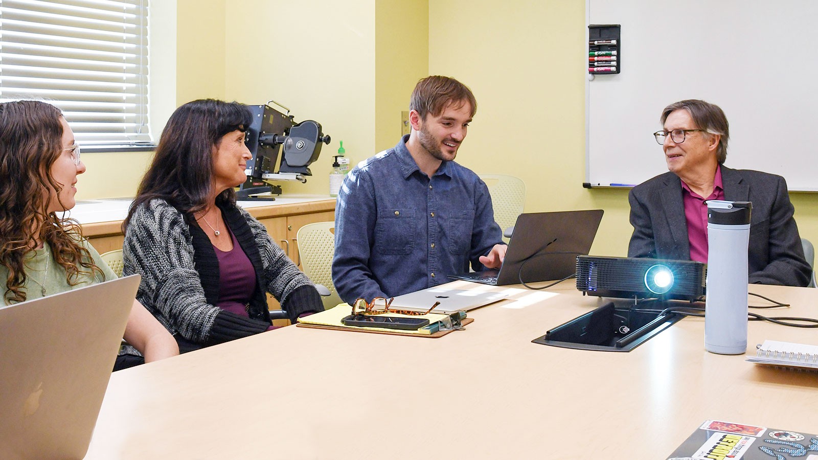 Researchers in a conference room.