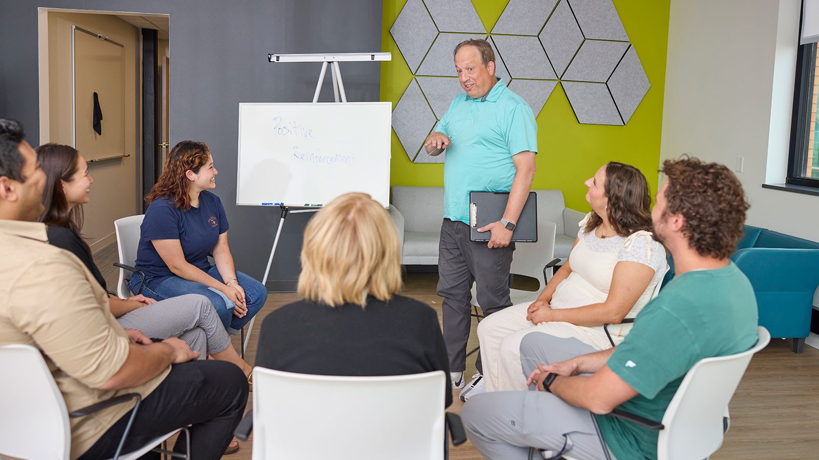 People in a classroom discussion.