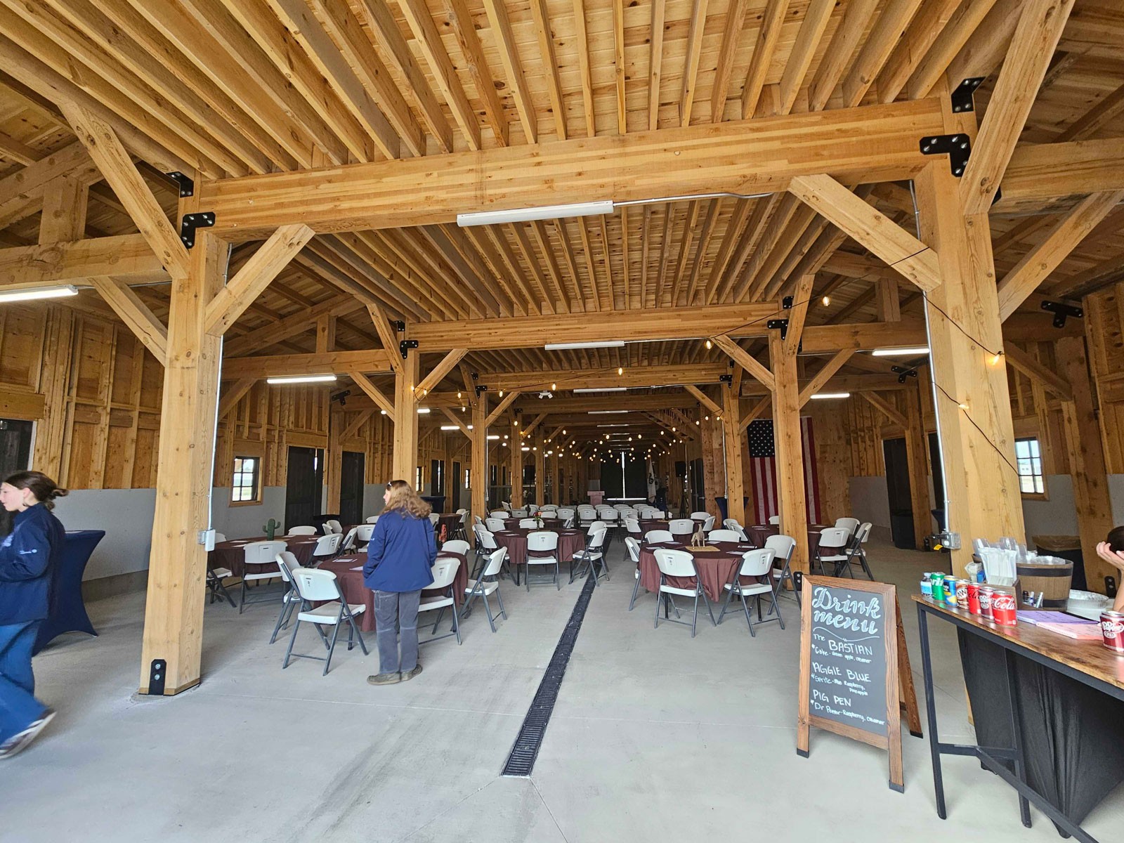 The interior of a large barn.