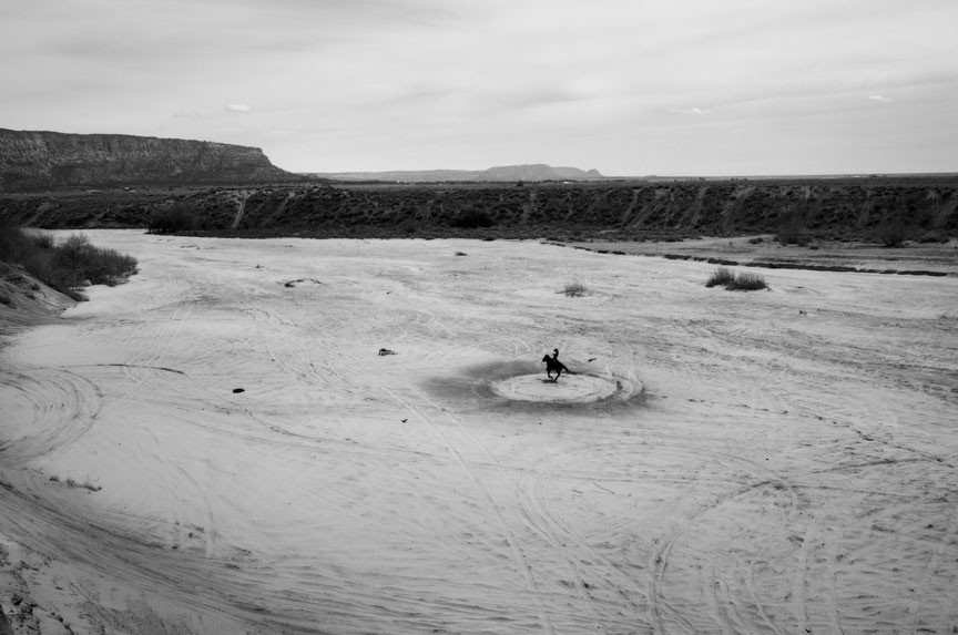 A black and white photo of a desert landscape.