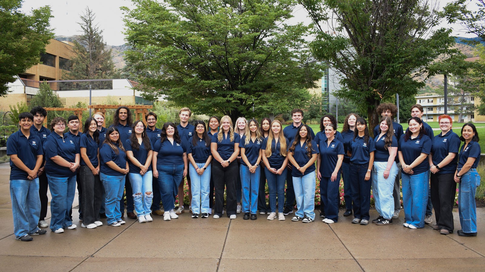 A group photo of dozens of Utah State students.