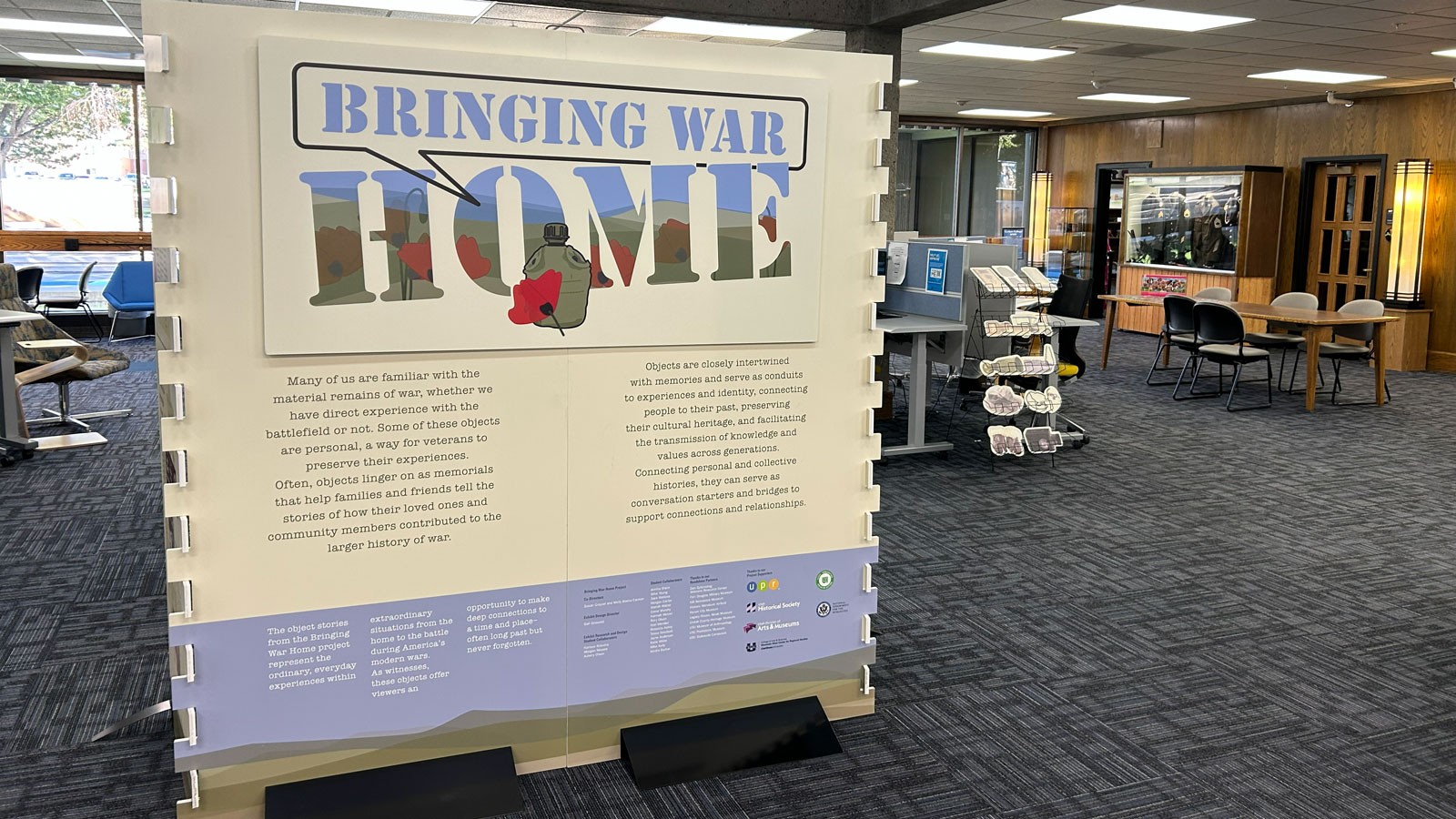 A museum display titled Bringing War Home.