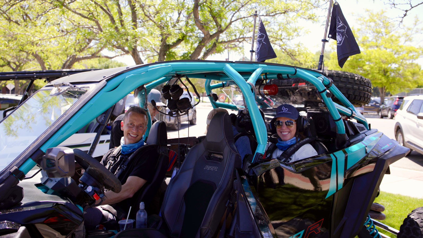 People in a side-by-side UTV.