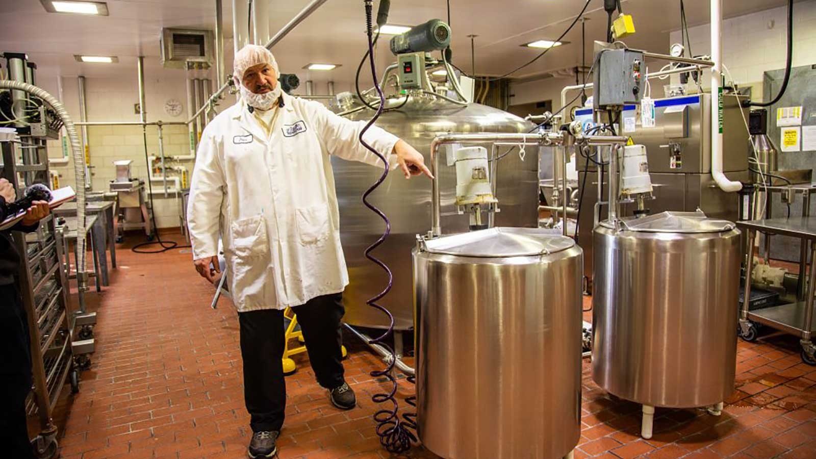Creamery Manager Dave Irish shows some of the equipment used to create Aggie Ice Cream.