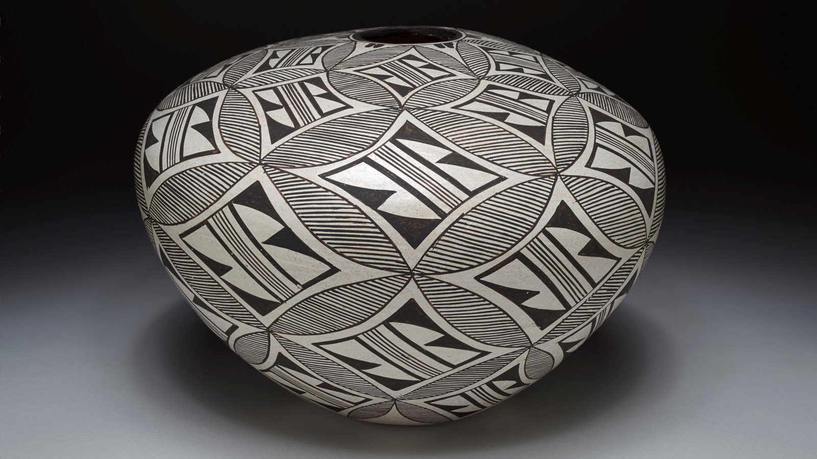 A ceramic vase with an intricate design.