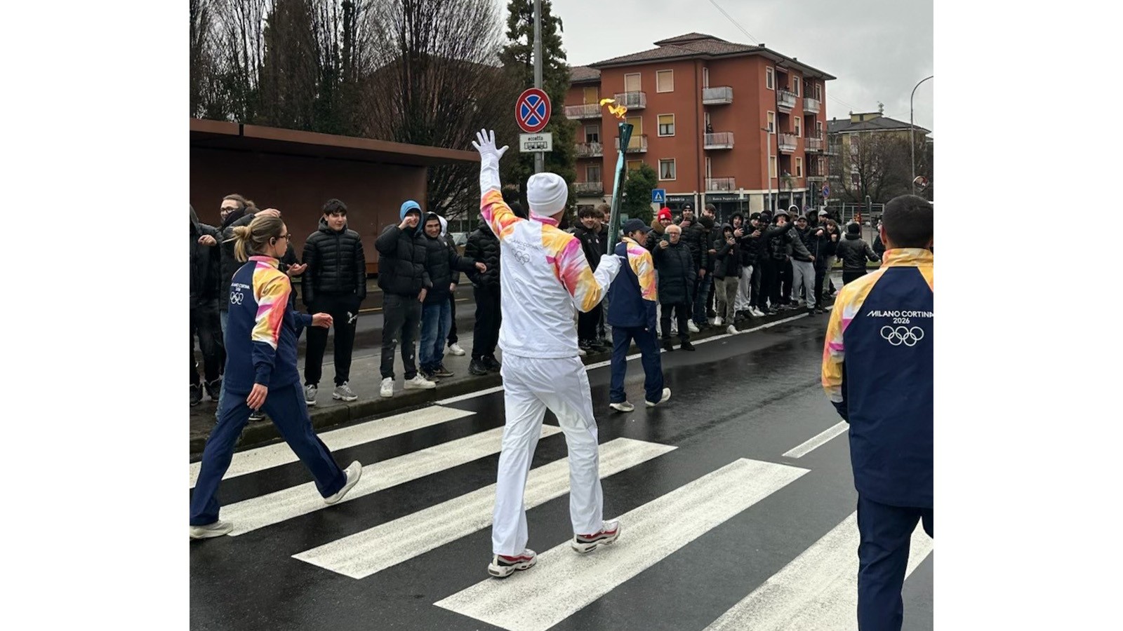 David H. Huntsman Carries the Olympic Torch in Italy