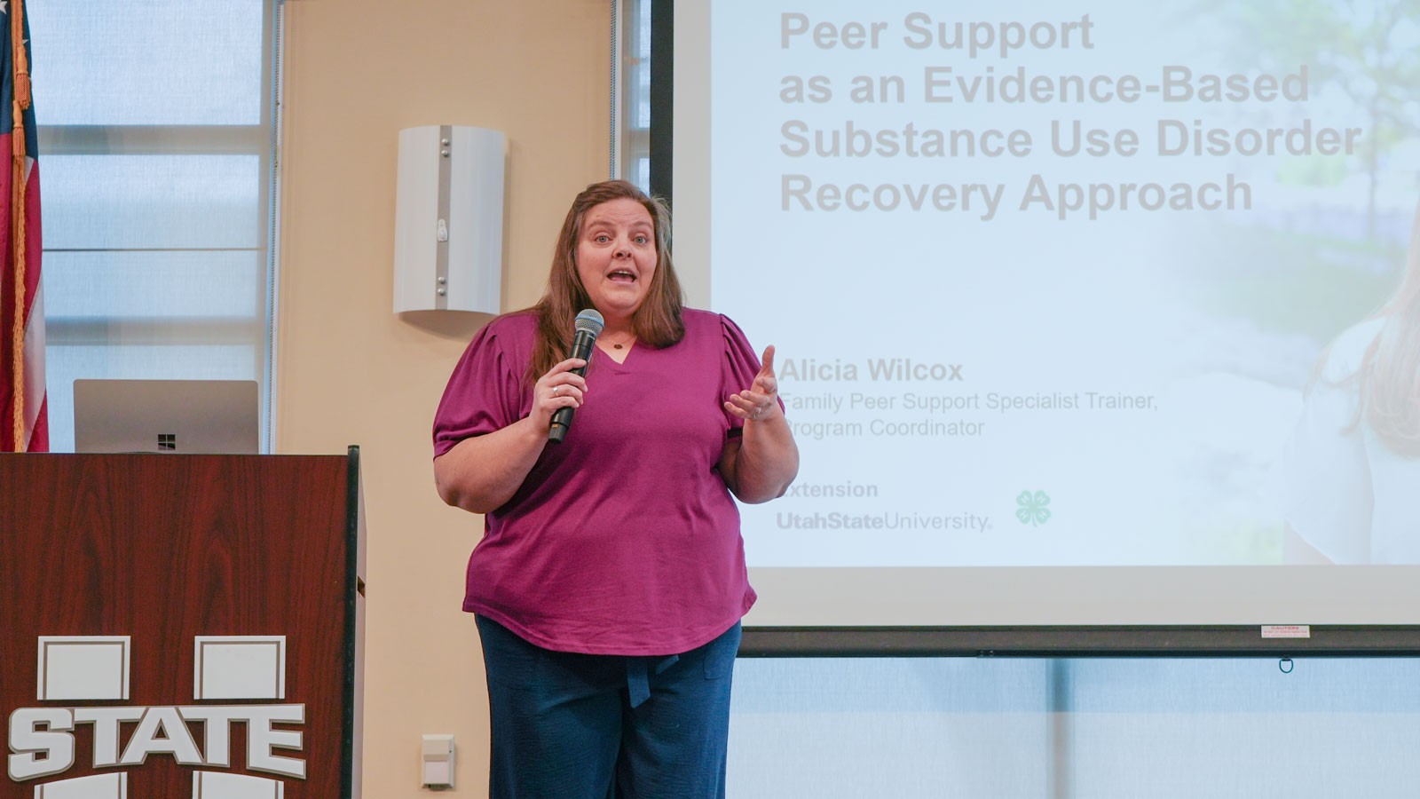 Alicia Wilcox giving a presentation.