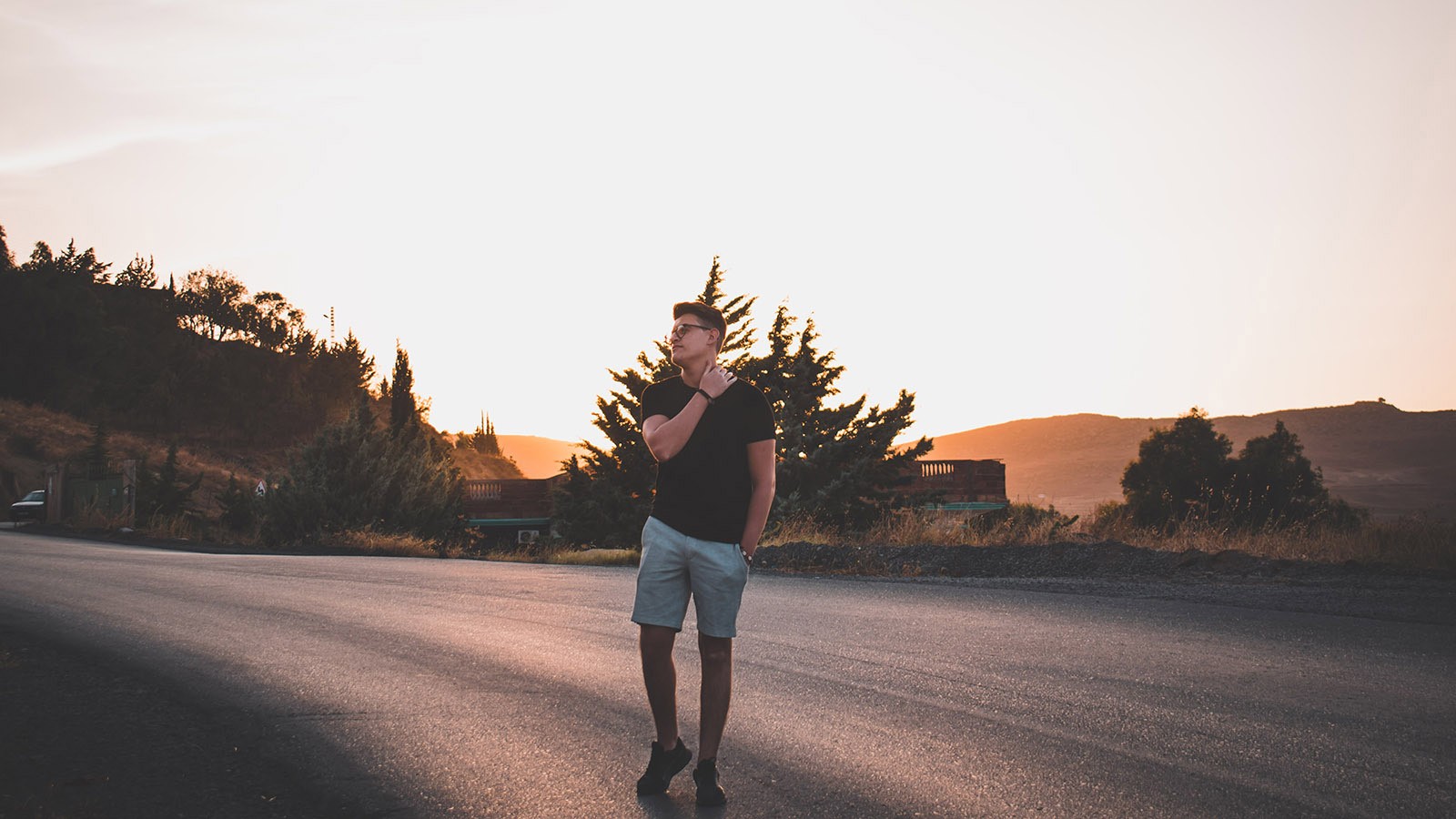 Man walking on a road.