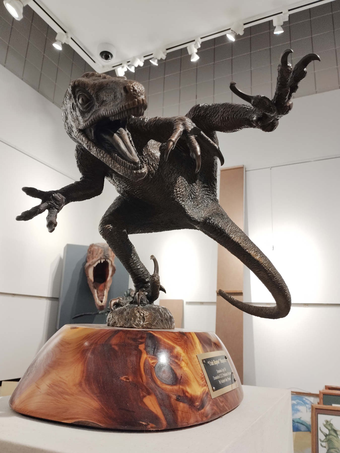 A sculpture of a Utah raptor dinosaur.