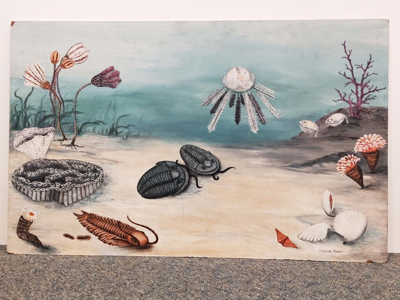 A painting of prehistoric sea creatures.