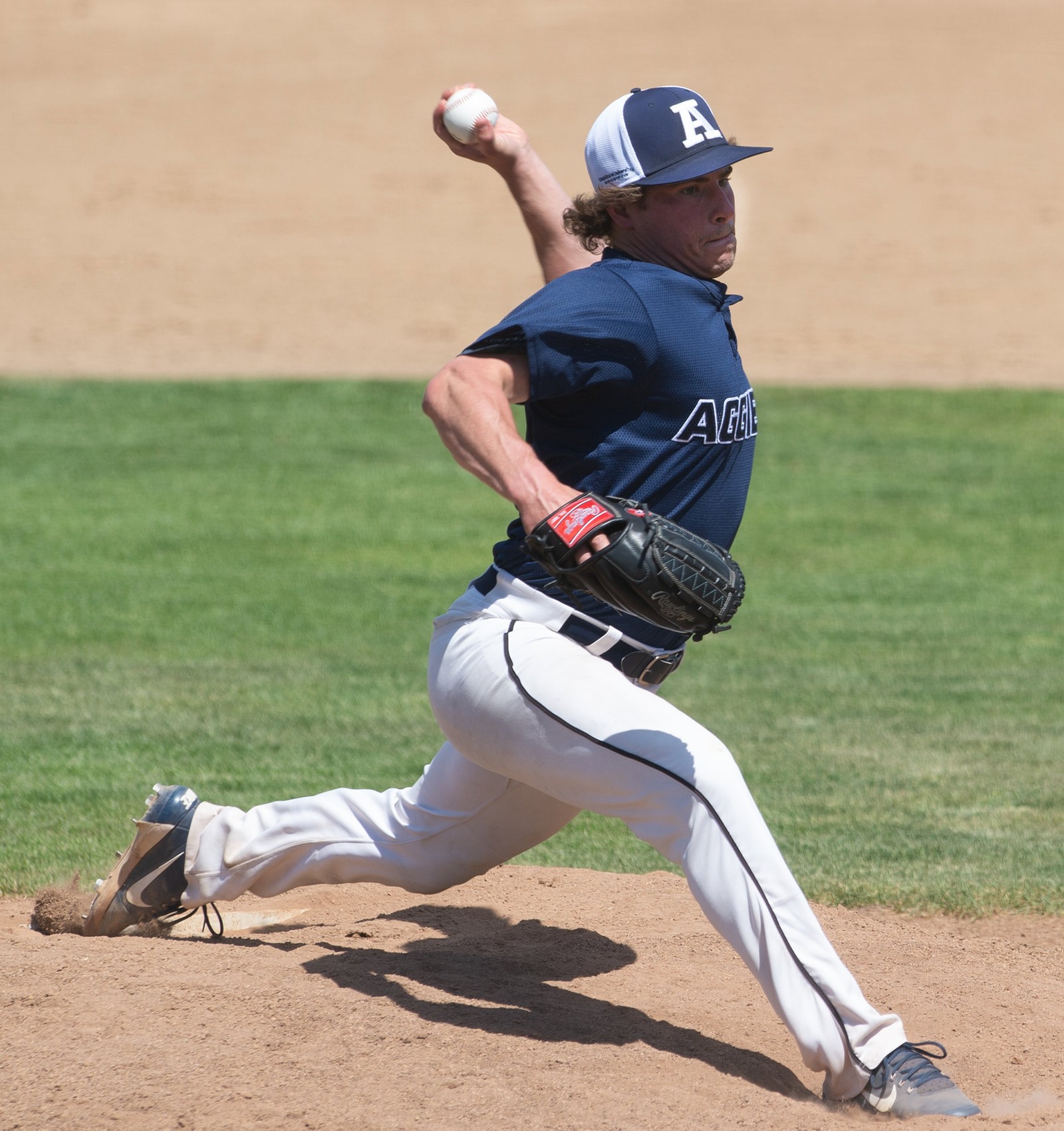 USU baseball team member throws a pitch.