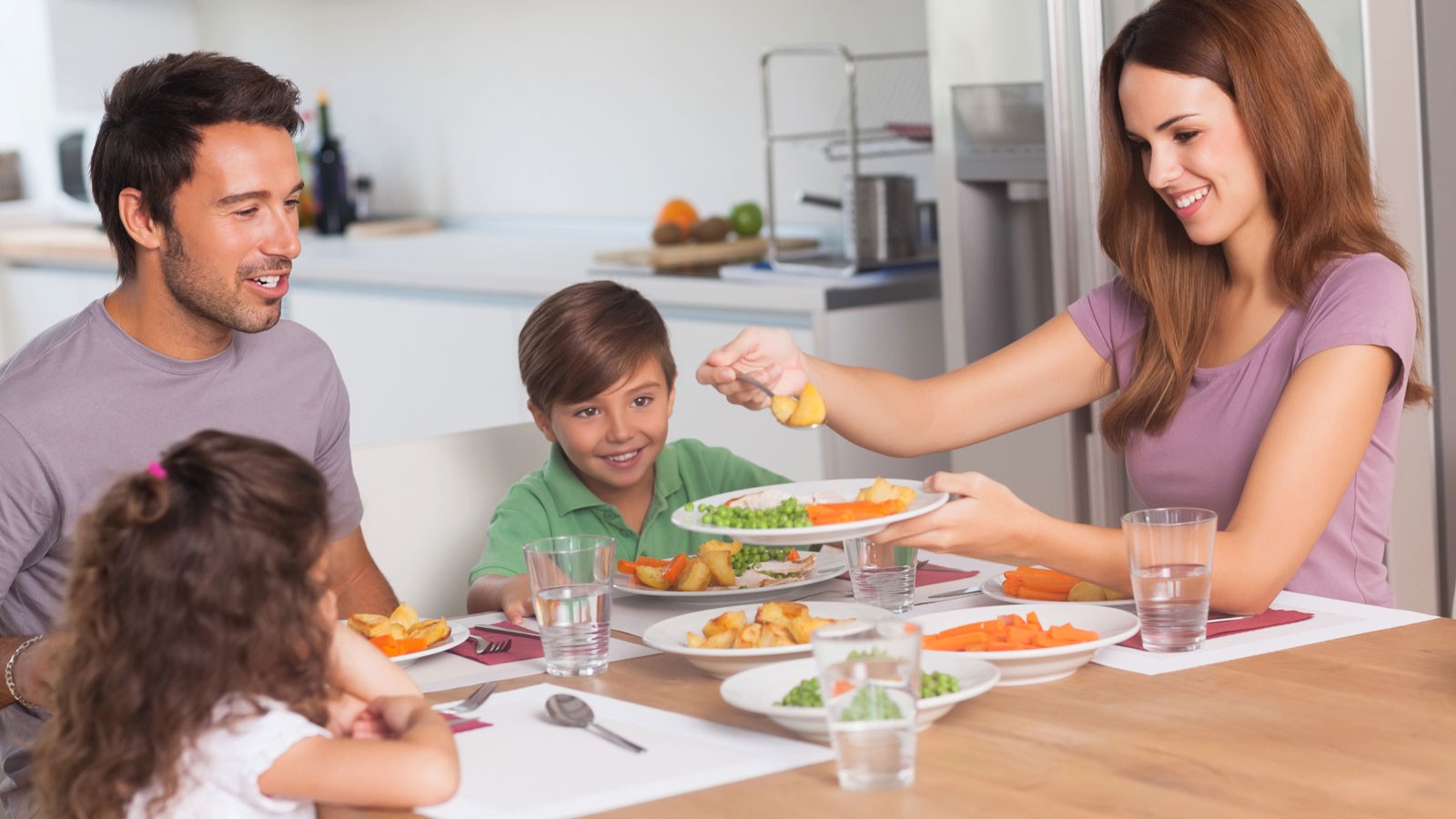 A family at the dinner table.