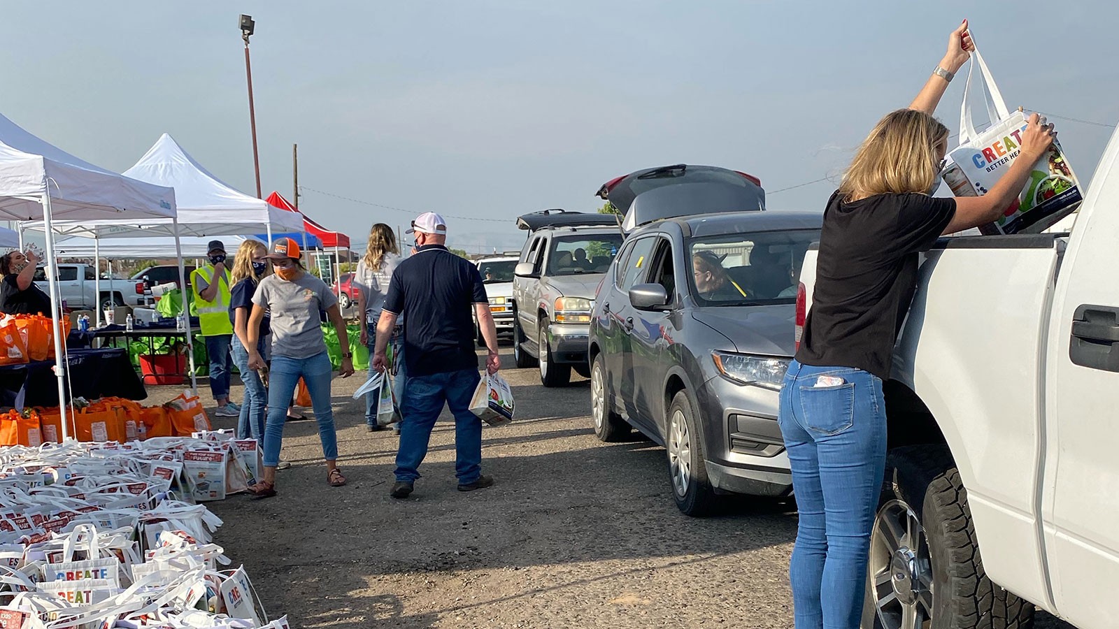 Volunteers at previous Farmers Feeding Utah “Miracle Projects.”