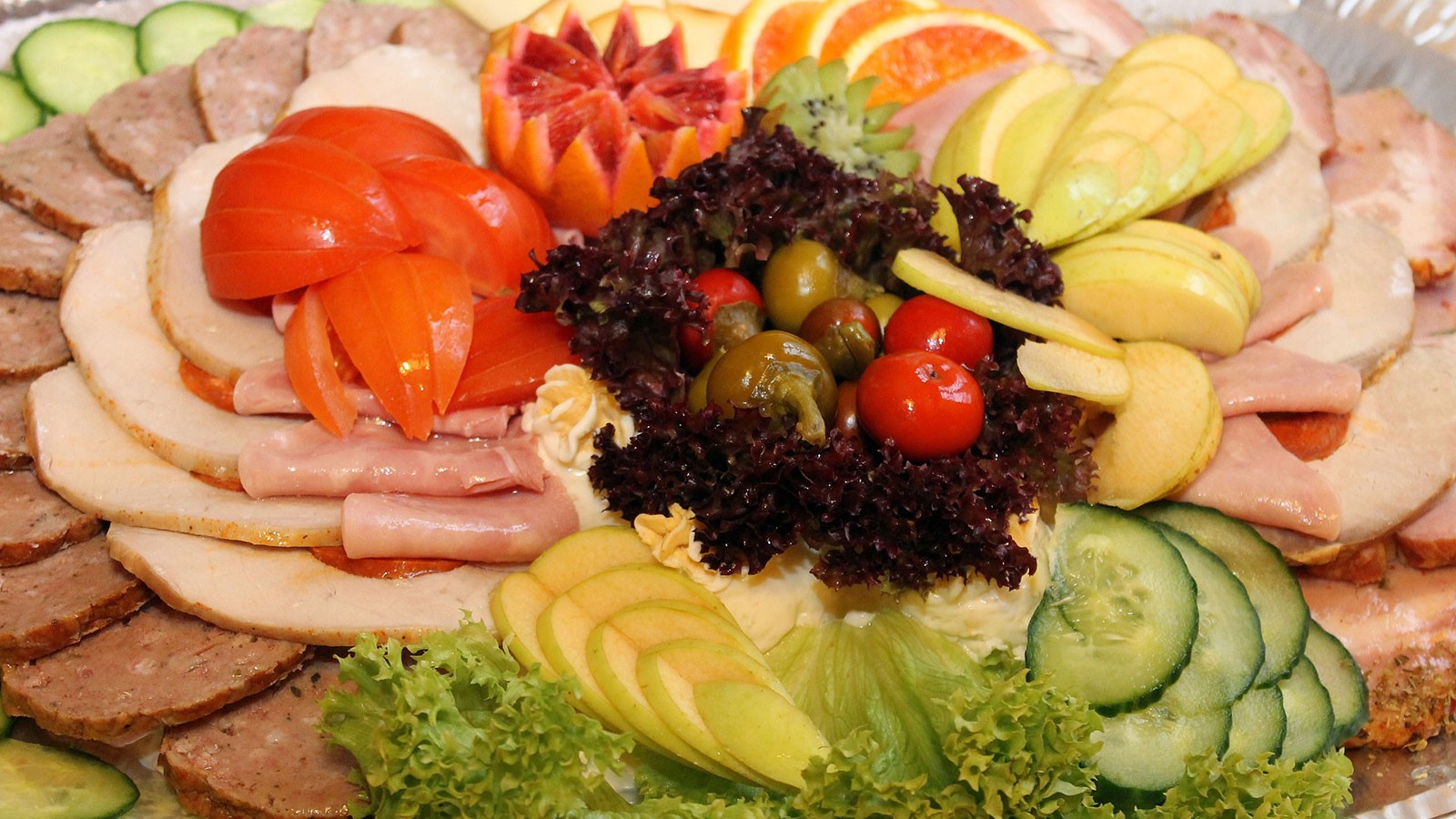 food platter with sandwich fixings.