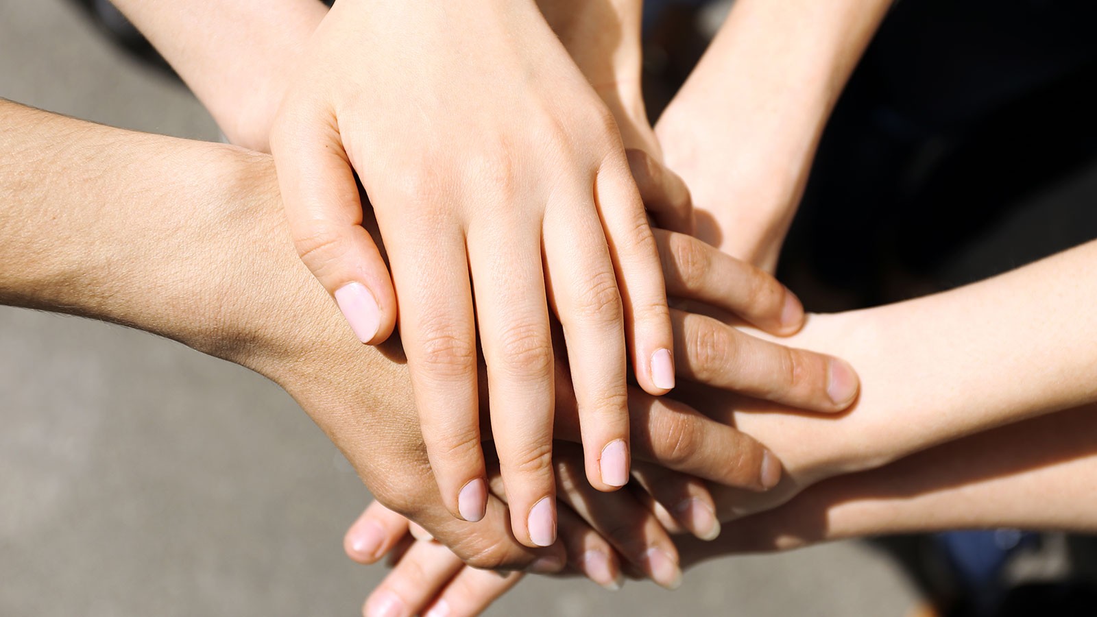 group of hands united together.