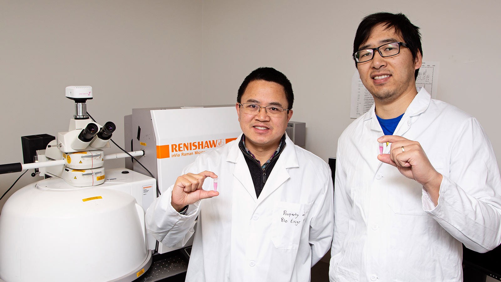 Professor of biological engineering Anhong Zhou and PhD student Wei Zhang