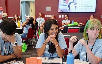Students sitting at a table.