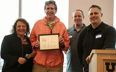 Site coordinator, Walt Acra, receiving an award.