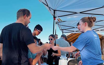 Students at a booth.