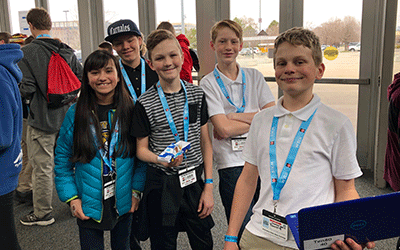 Kennedy Jr High students as SEMA cuSTEM Car Experience.
