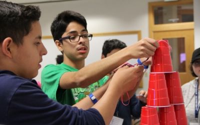 Students working together in team building activity.