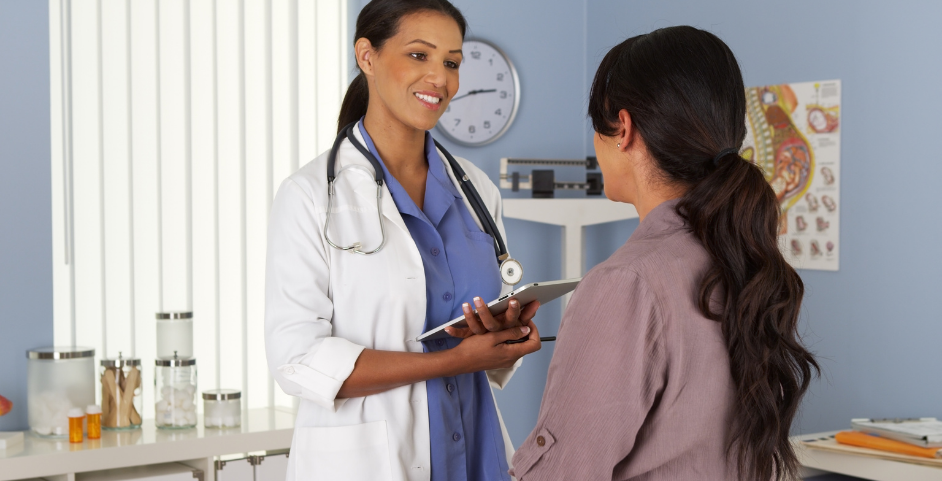 woman talking to a female doctor